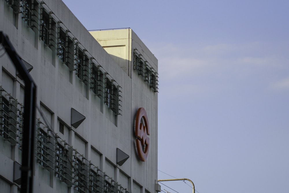 a tall building with a clock on the side of it