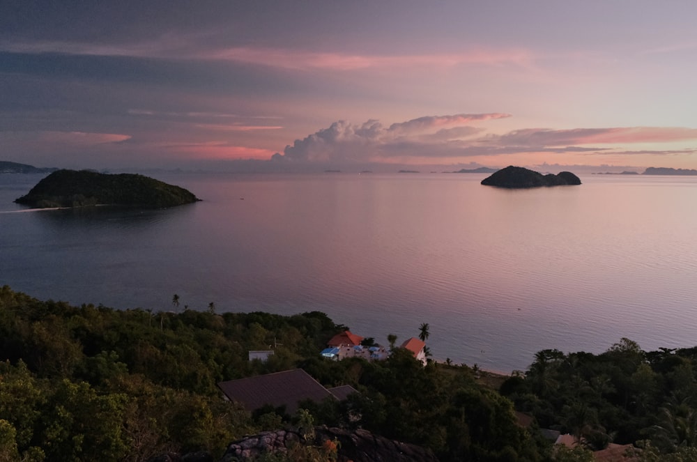 a view of a body of water with a small island in the distance