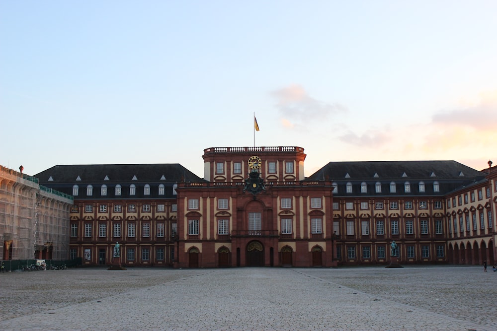 a large building with a flag on top of it