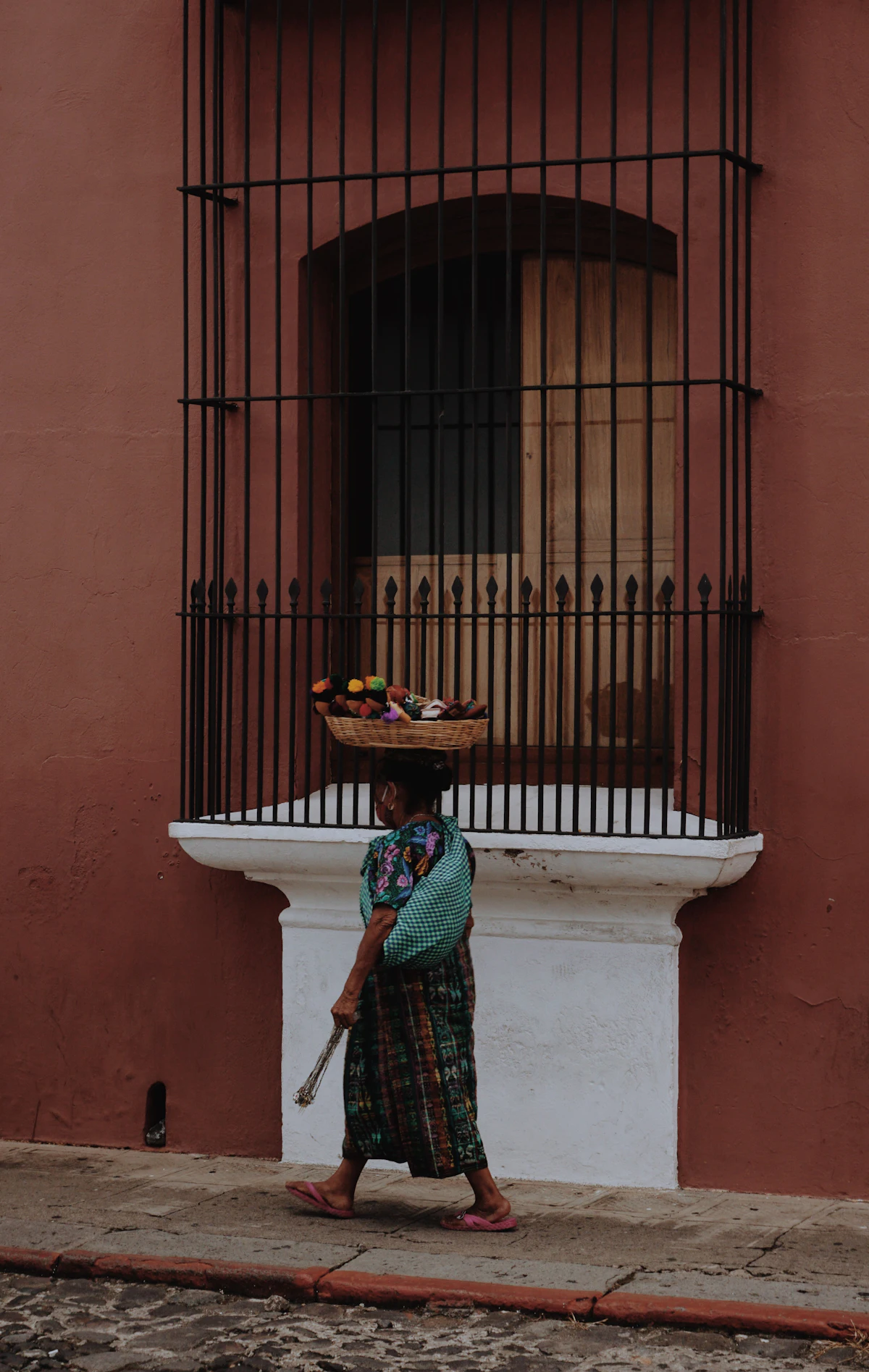 An older woman in traditional Guatemalan dress in Antigua