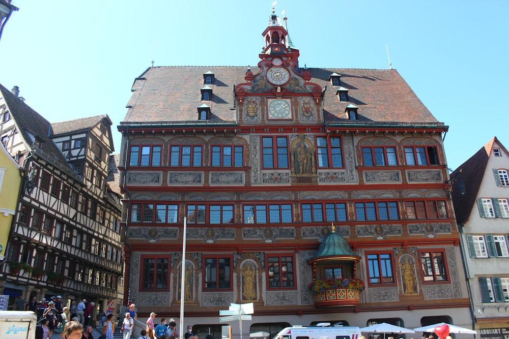a large building with a clock on the top of it