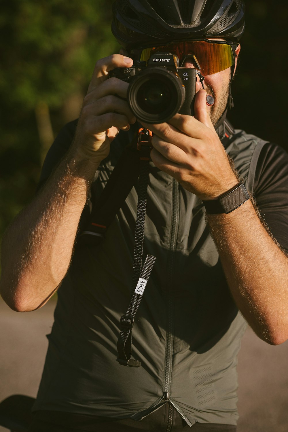 a man taking a picture of himself with a camera