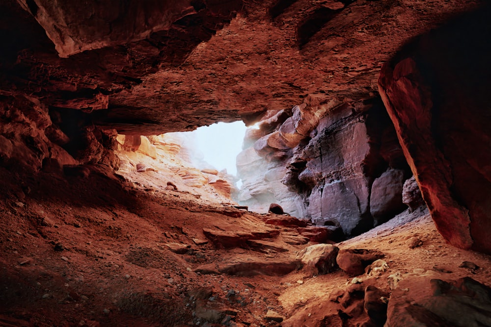 a cave with a small opening in the middle of it