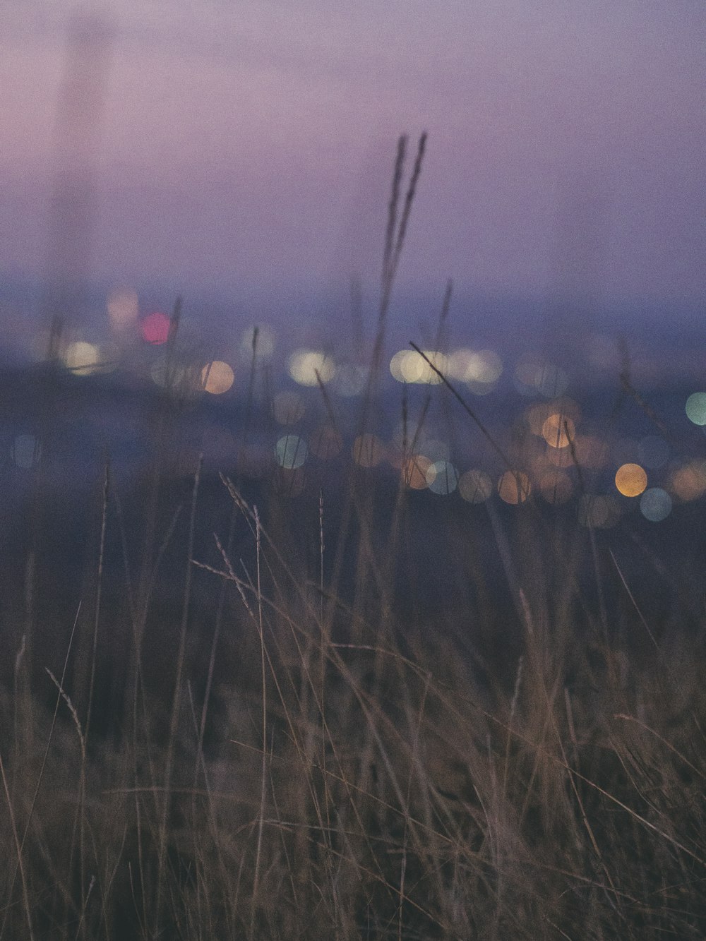 a blurry photo of a city at night