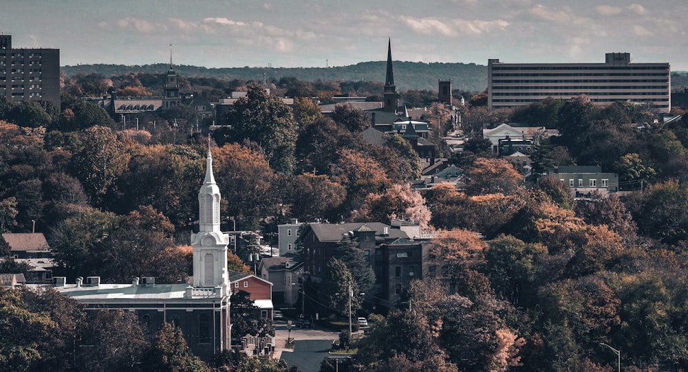 a view of a city with a church steeple