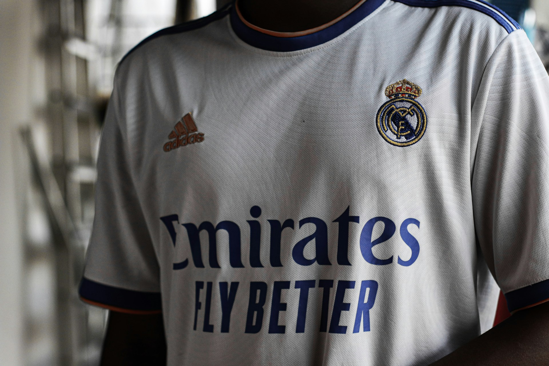 a close up of a soccer jersey on a person