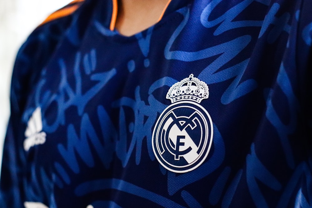 a close up of a soccer jersey with a crown on it