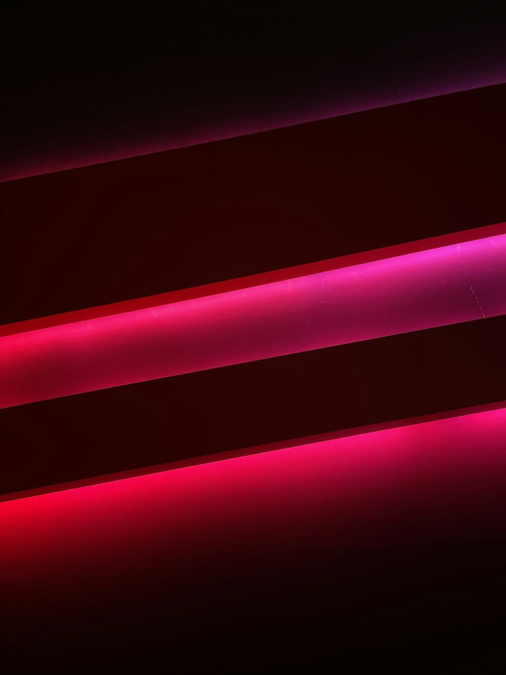a close up of a red and purple light