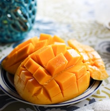 a close up of a plate of fruit on a table