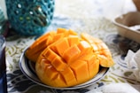 a close up of a plate of fruit on a table
