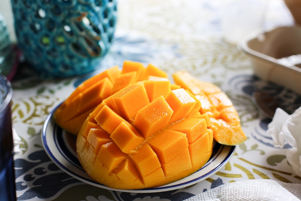 a close up of a plate of fruit on a table