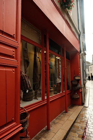 a red store front with a window display