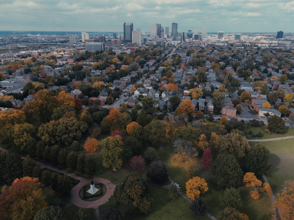 an aerial view of a city with lots of trees