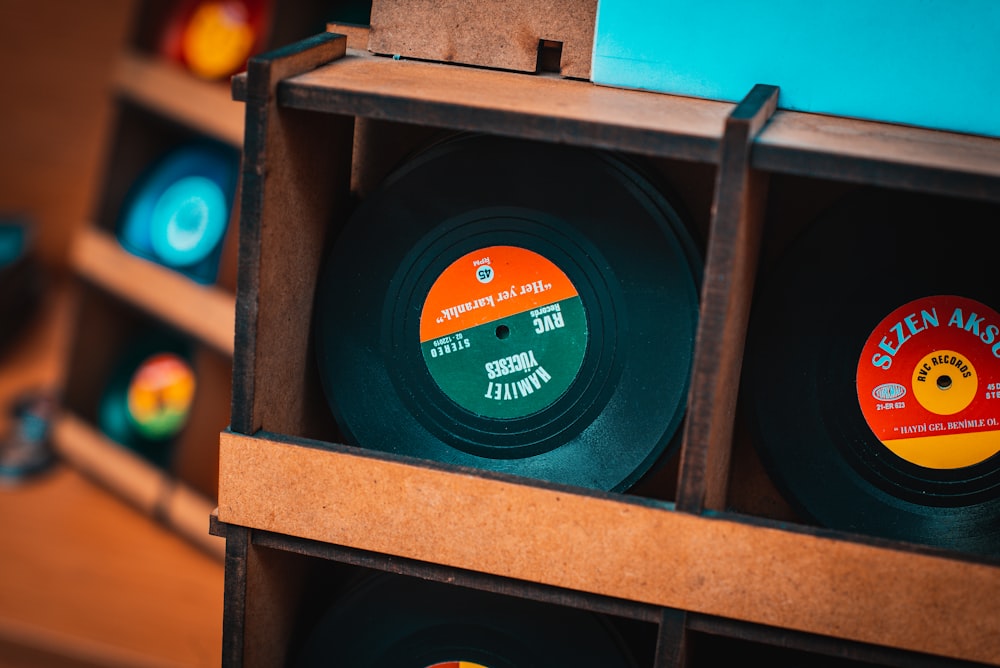 a collection of records in a wooden box