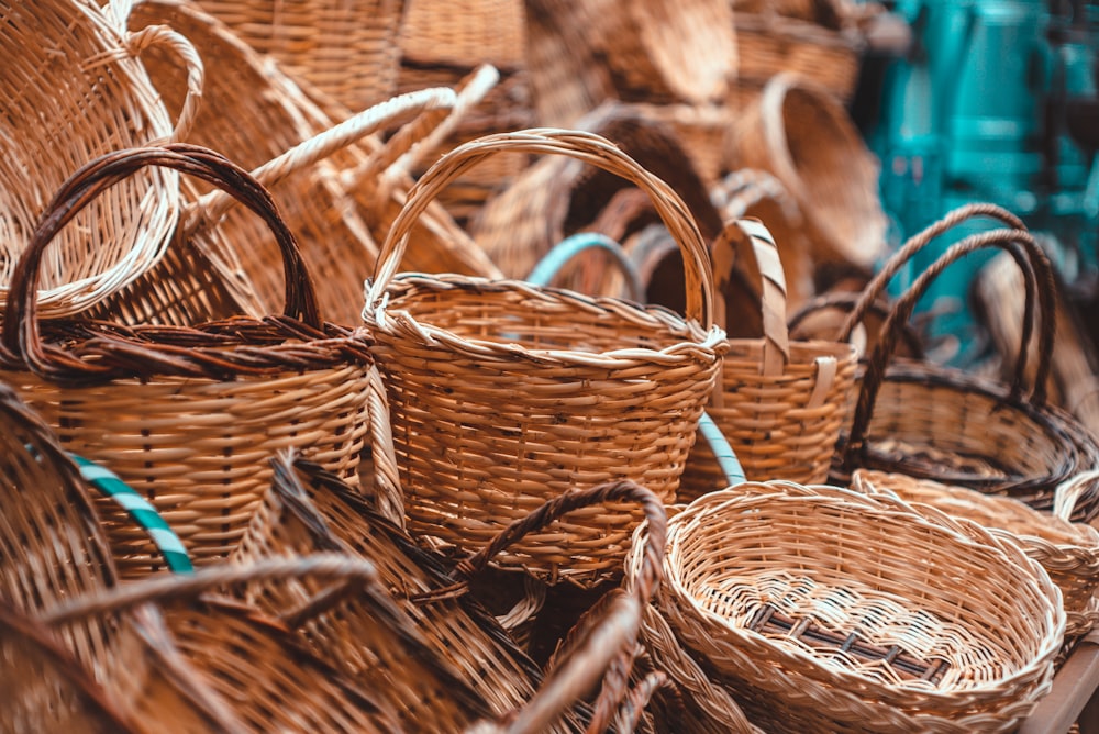 a pile of wicker baskets sitting next to each other