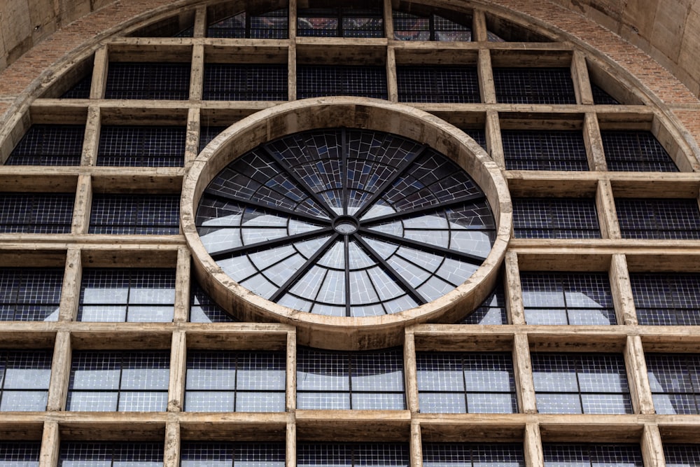 a large window with a circular window in the middle of it