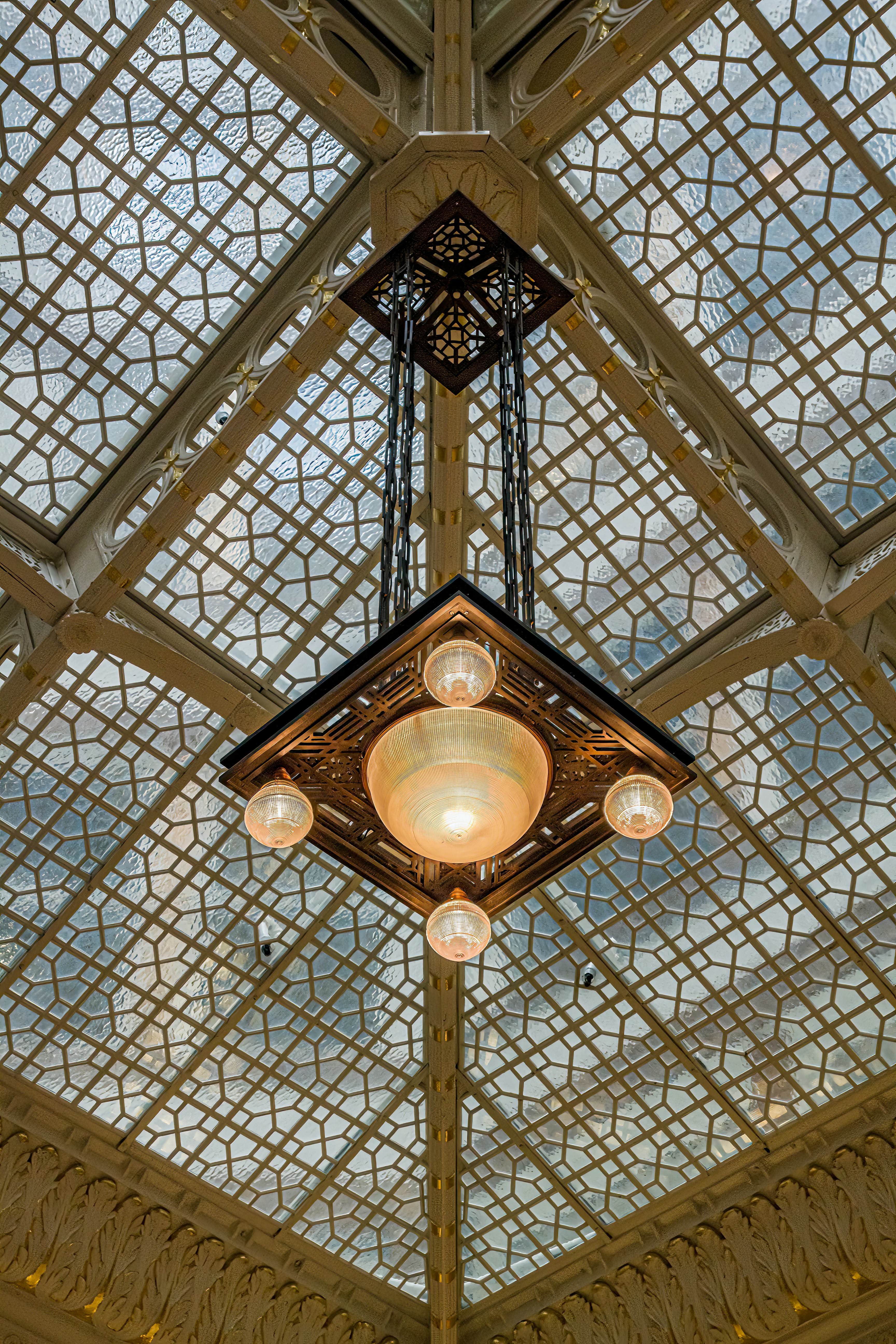 a chandelier hanging from the ceiling of a building