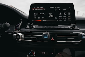 the dashboard of a car with a digital display