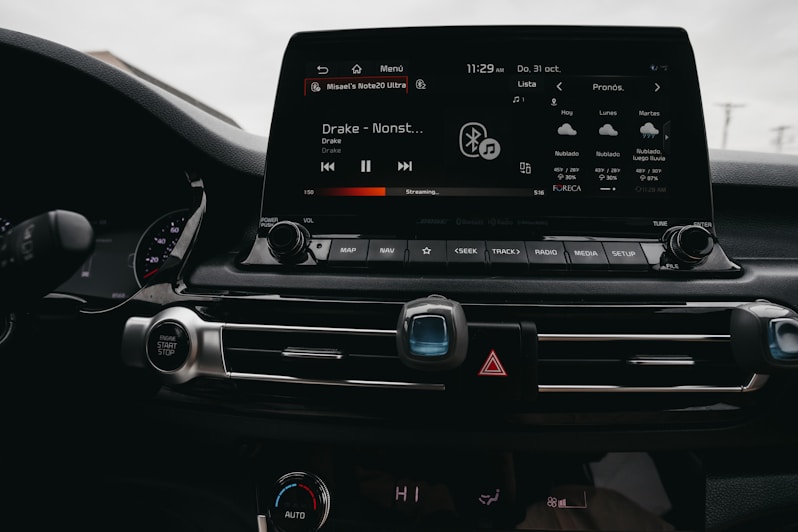the dashboard of a car with a digital display