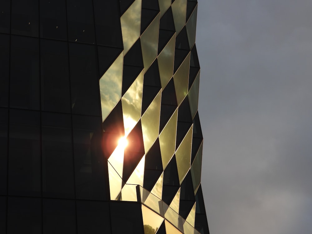 the sun is shining through the windows of a building