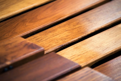 Close-up of durable wood textures in a furniture store display.