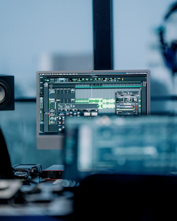 a computer monitor sitting on top of a desk