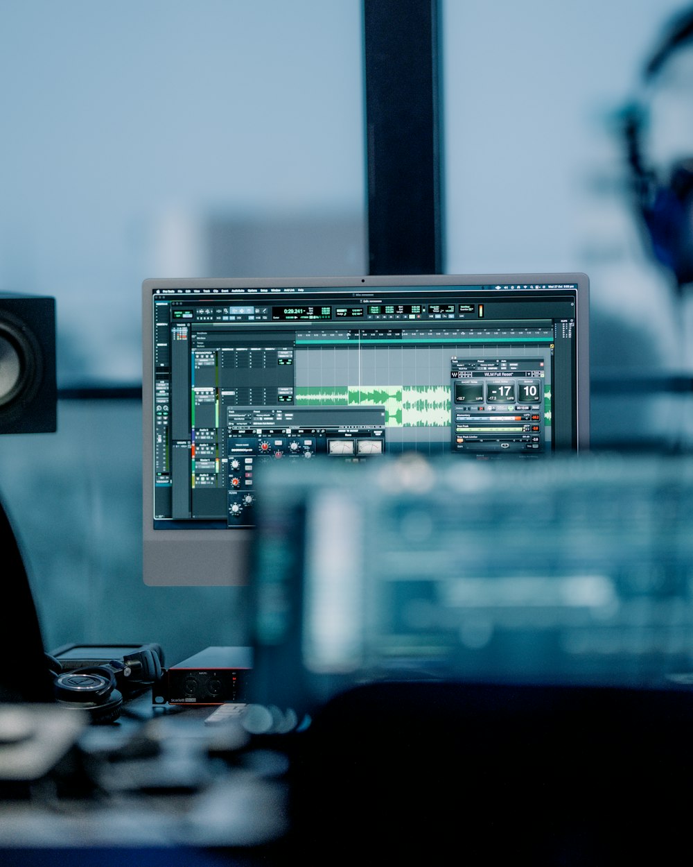 a computer monitor sitting on top of a desk