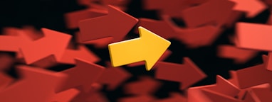 a yellow arrow is surrounded by red arrows
