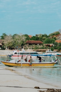 Colorful boats docked at a tropical beach in the Caribbean