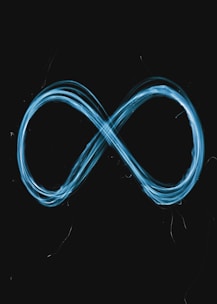 a blue light painting of an infinite sign
