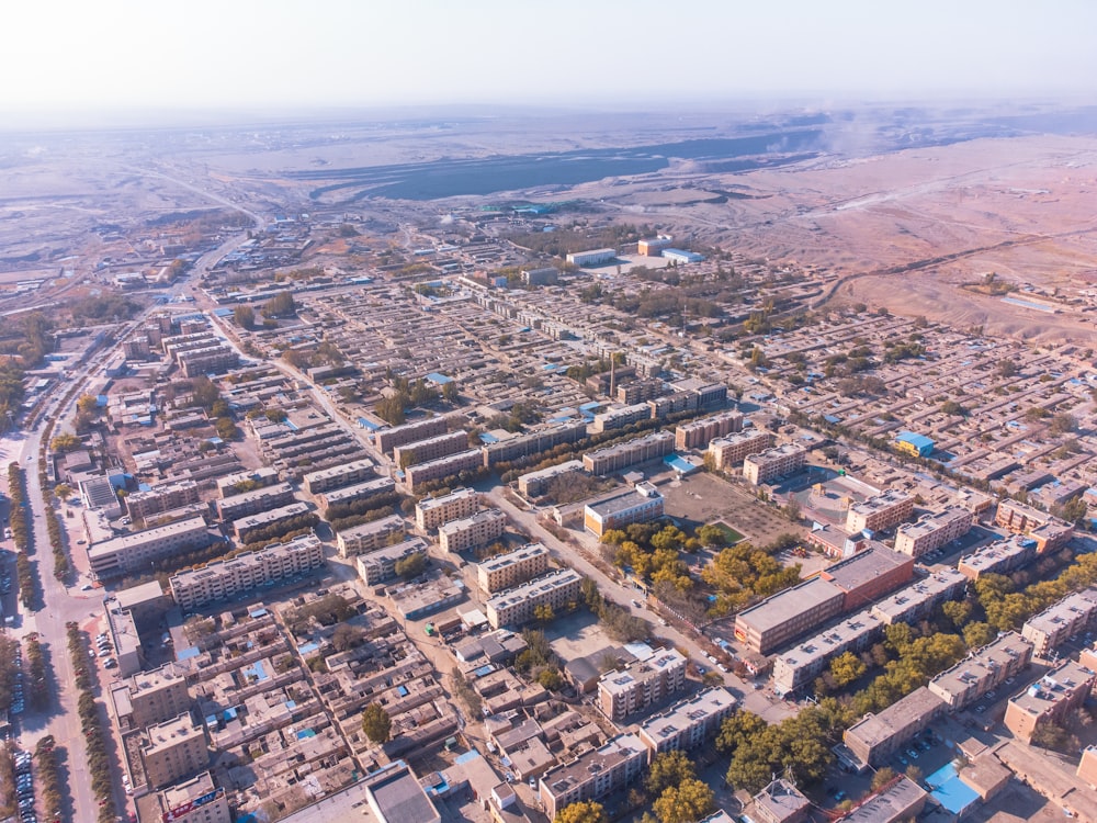 an aerial view of a city with lots of buildings