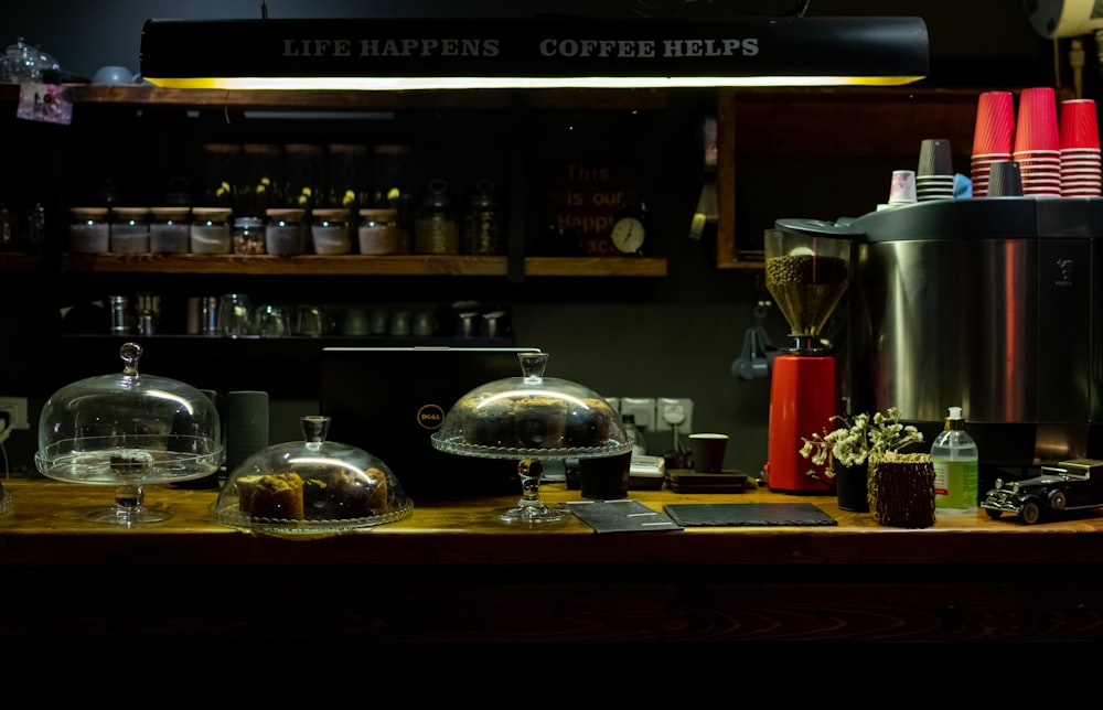 a counter with a variety of coffee items on it
