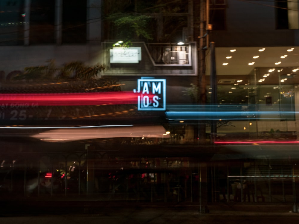 a blurry photo of a city street at night