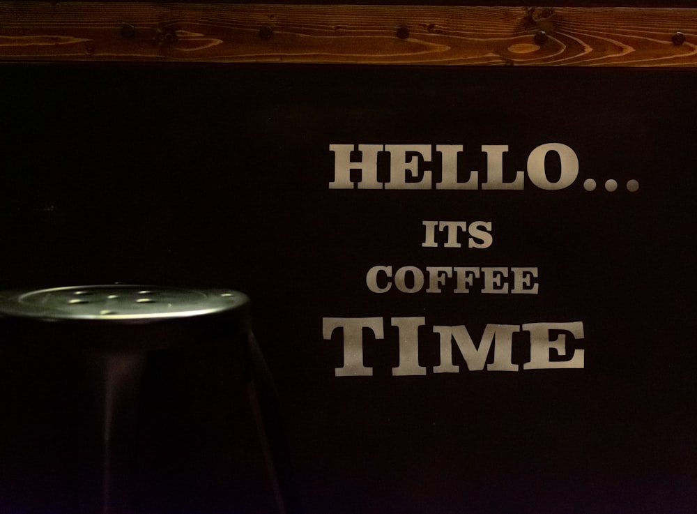 a sign that says hello it's coffee time