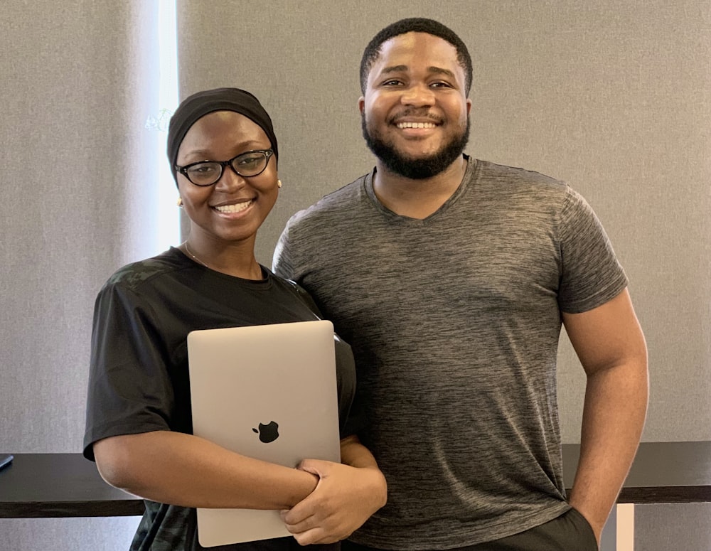 a man and a woman standing next to each other