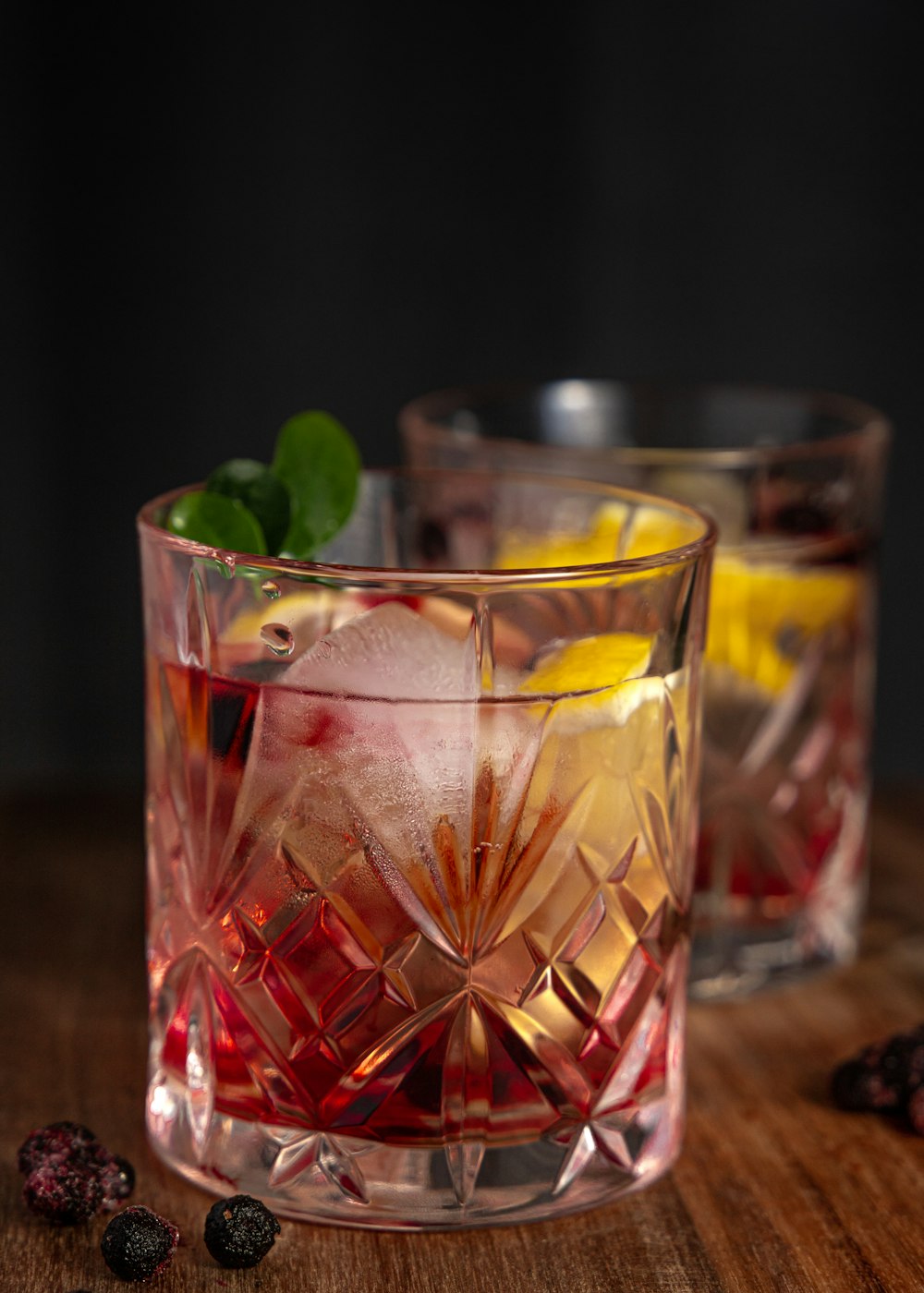 a close up of a glass of alcohol on a table