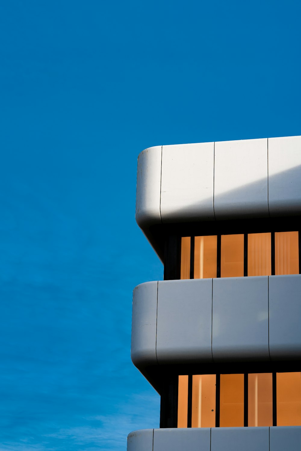 a tall building with a clock on the side of it