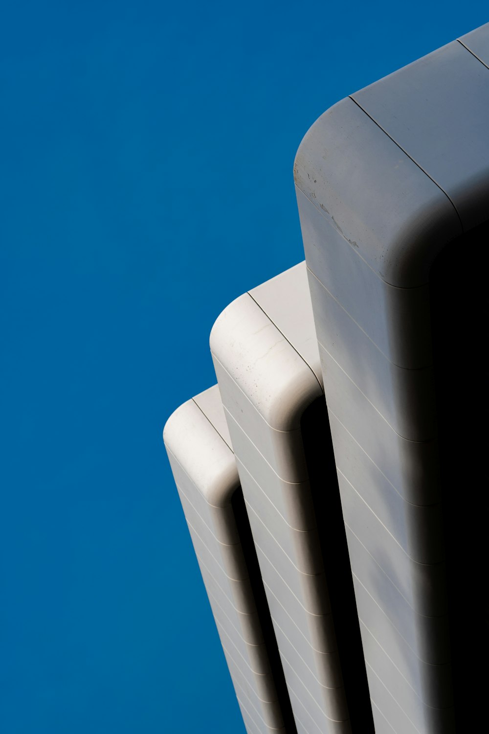 a close up of a building with a blue sky in the background