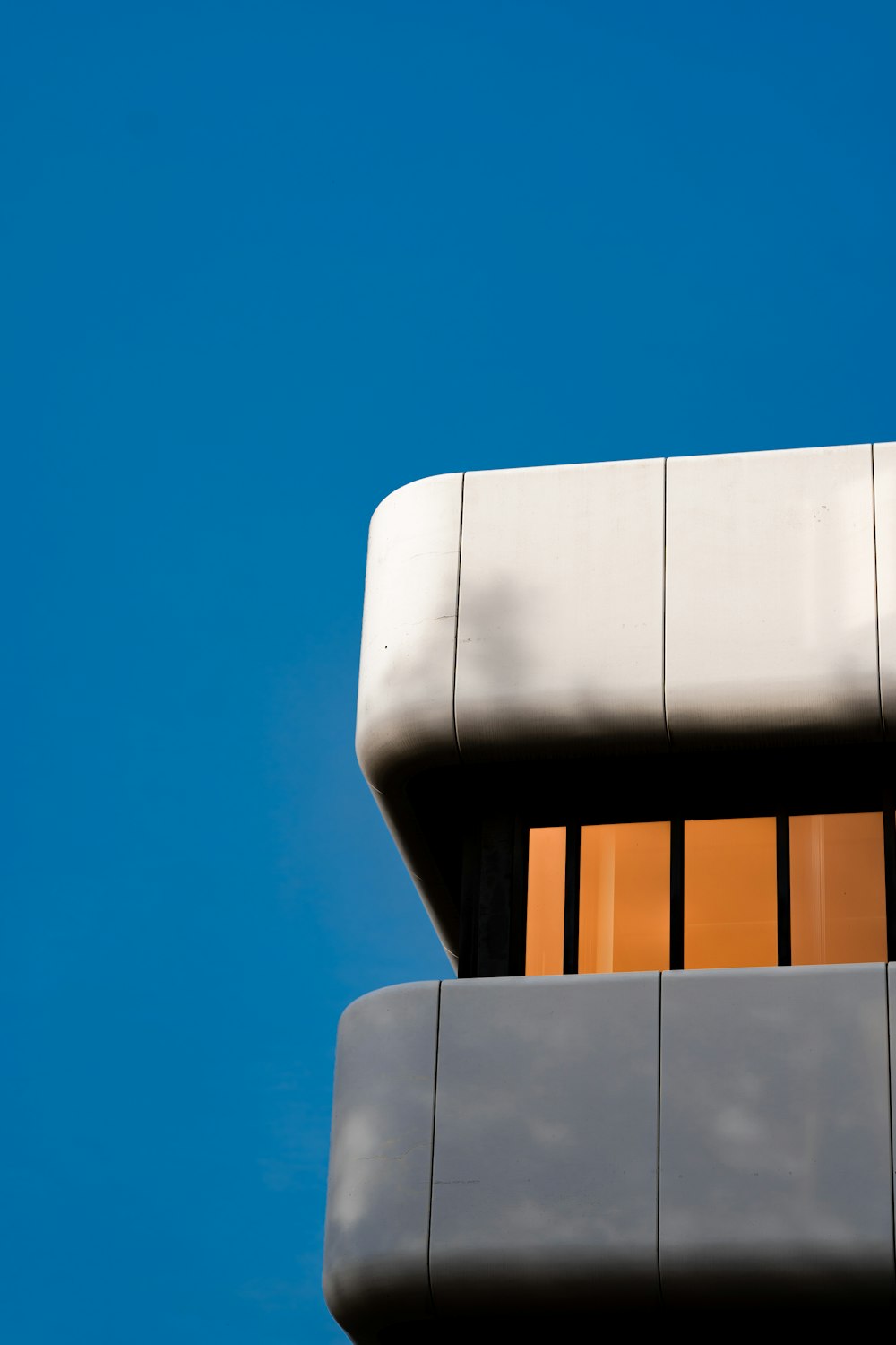 a tall building with a clock on the top of it