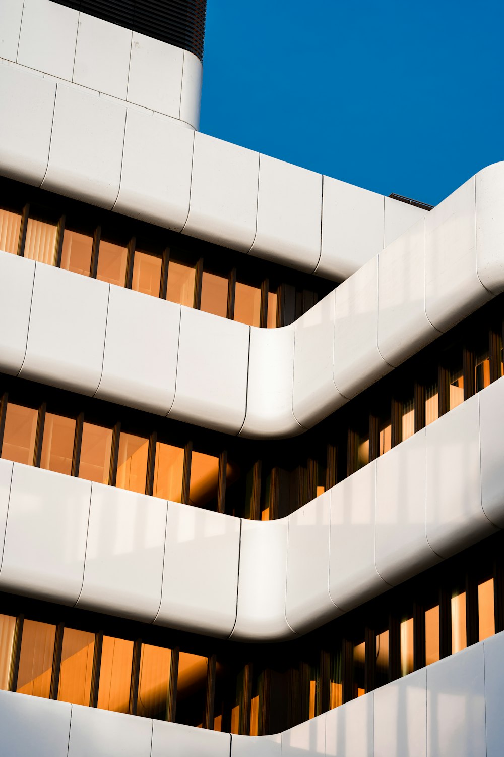 a close up of a building with a sky background