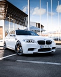 a white bmw m5 