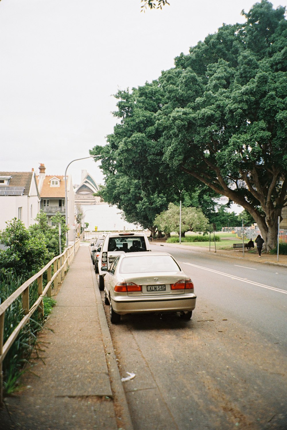 a car is parked on the side of the road