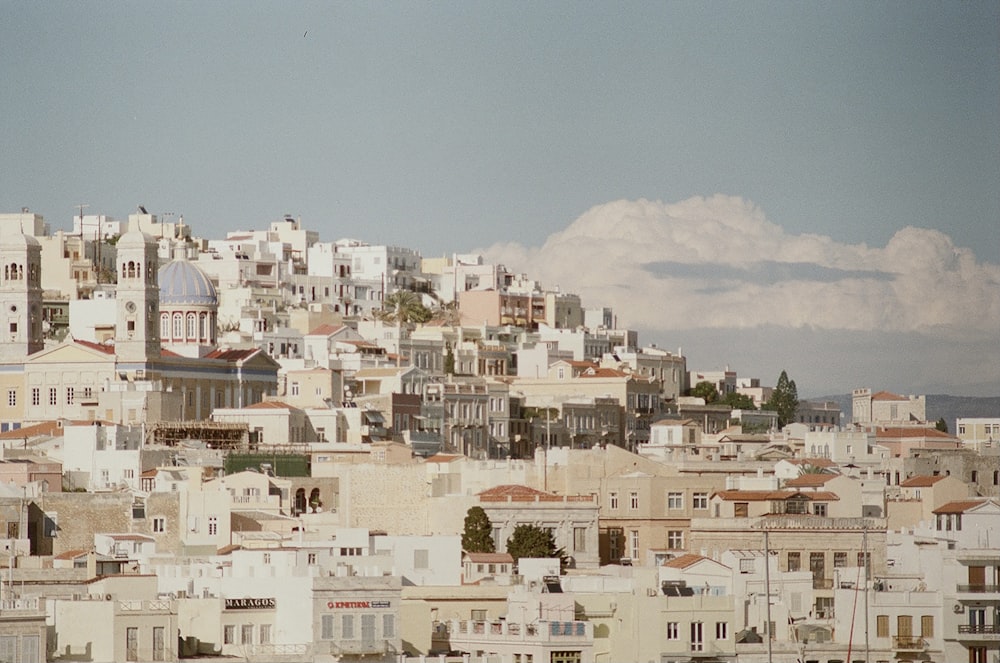 a large group of buildings on top of a hill