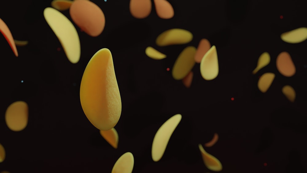 a bunch of yellow petals floating in the air