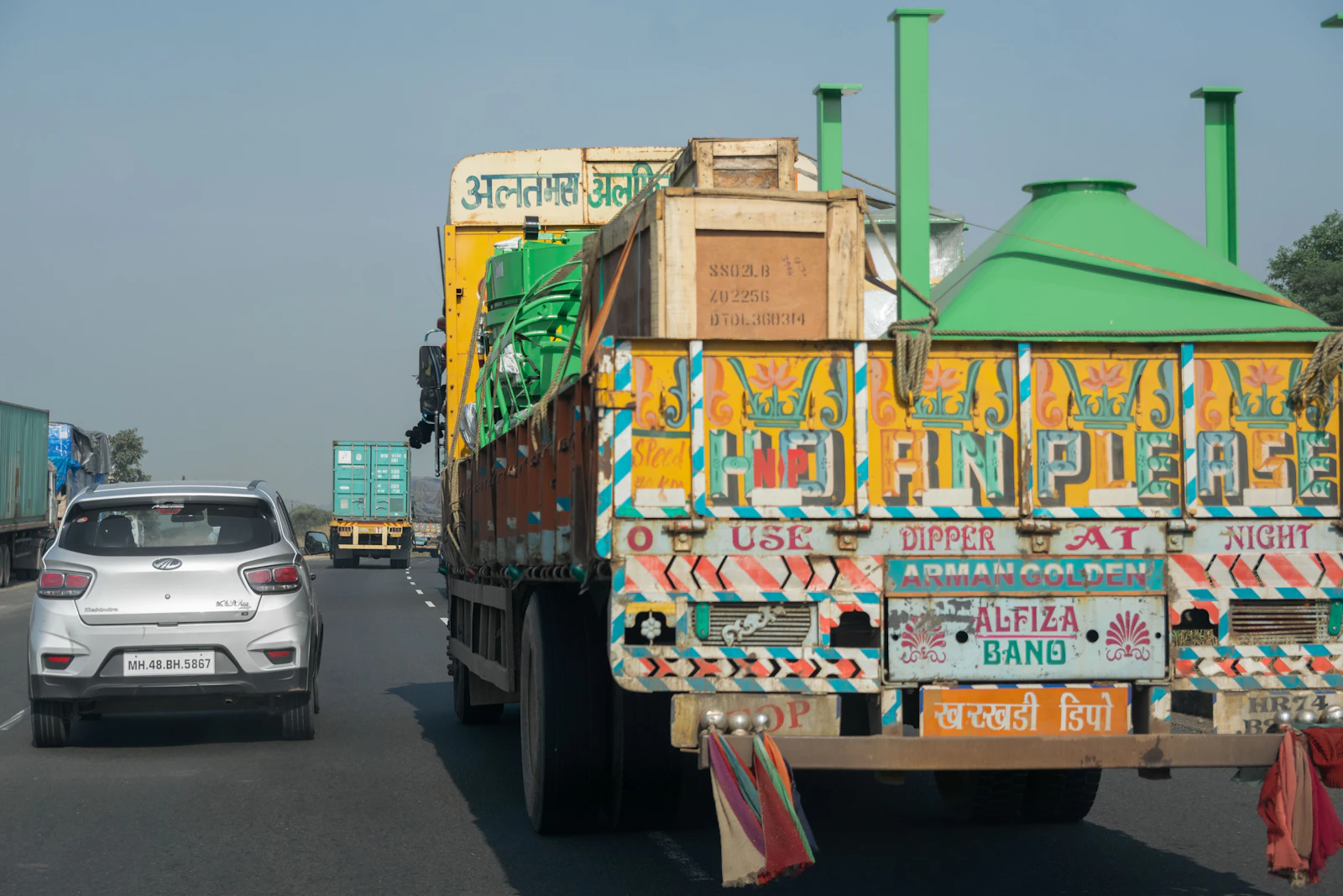 Compact truck moving through city traffic