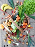 a basket filled with lots of different types of vegetables