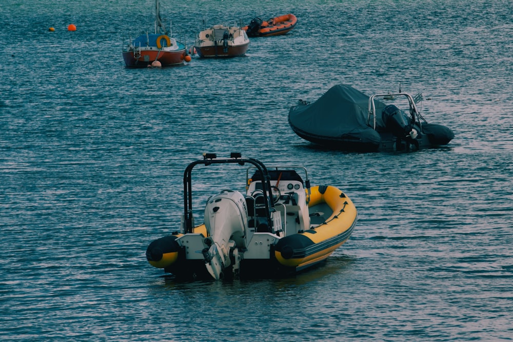 a small boat in the middle of a body of water