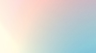 a blurry photo of a plane flying in the sky