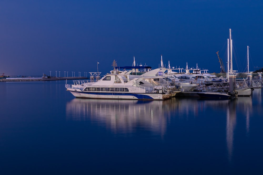 a group of boats that are sitting in the water