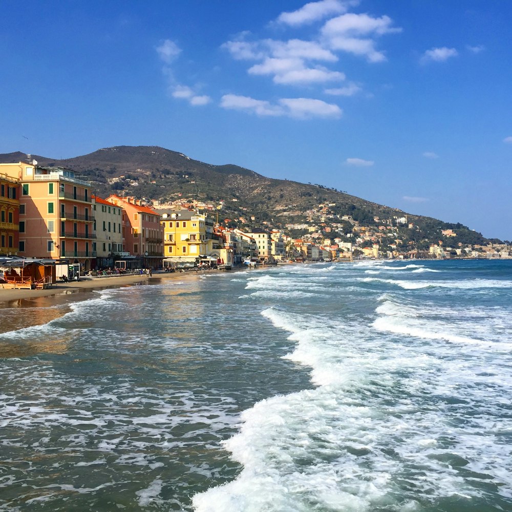 a beach that has some buildings on it